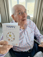 Resident showing his greeting card